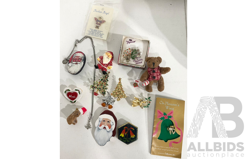 Selection of Christmas Themed Broaches, Badges and Necklace
