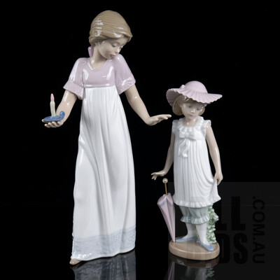 Nao Figure of a Girl with Chamberstick and Another Nao Figure of a Girl with Umbrella