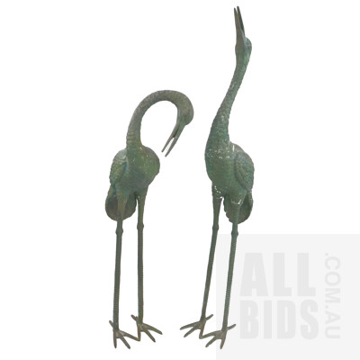 Two Patinated Cast Metal Cranes