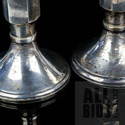 Pair of Weighted Sterling Silver Candlesticks, Birmingham, 1922 and 1924
