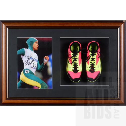 Framed and Signed Cathy Freeman Portrait with Signed Race Worn Shoes