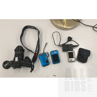 Assorted Cameras including Panasonic LUMIX GH4, Bed Side Tall Lamp And Garmin Nuvi 2597 Bluetooth GPS