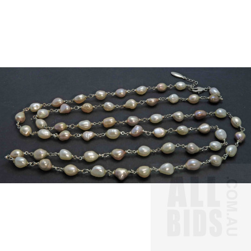 Extra long Necklace of Freshwater Pearls strung on silver tone links