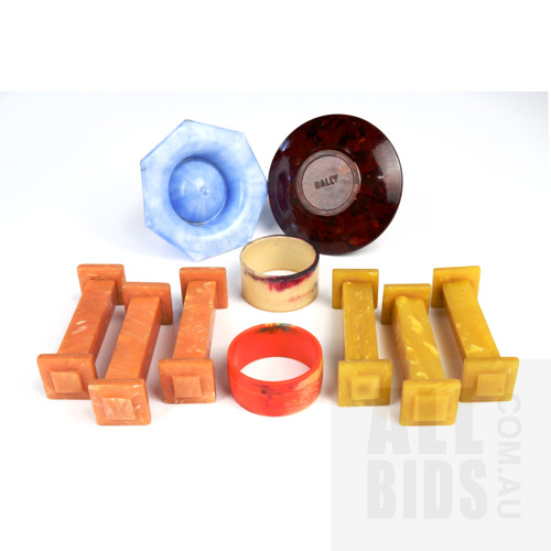Collection of Bakelite and Early Plastic Knife Rests, Napkin Rings and Egg Cups