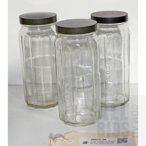 Three Vintage Tall Glass Storage Jars with Early Plastic Lids, Marked P.C.D.S