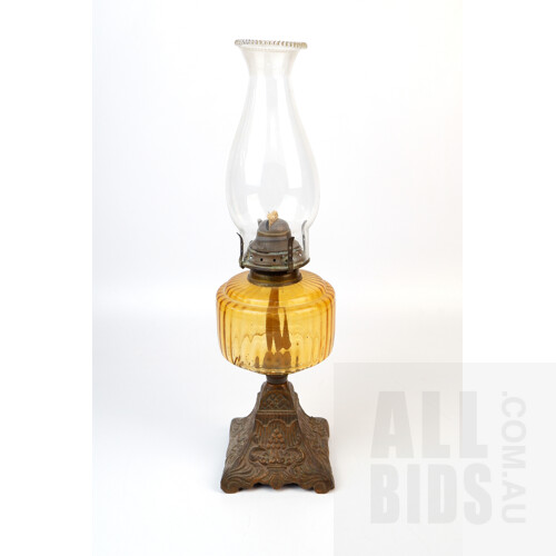 Victorian Banquet Lamp with Amber Glass Reservoir and Decorative Cast Iron Base