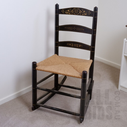 Antique Ebonized Rocking Chair with Rattan Seat, Early 20th Century