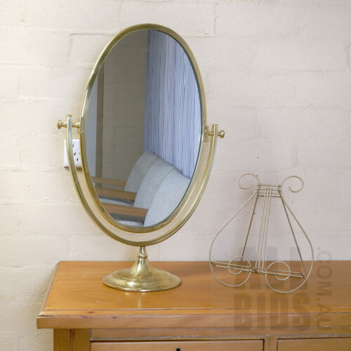 Large Brass Coloured Oval Mirror with Lyre Form Book Stand