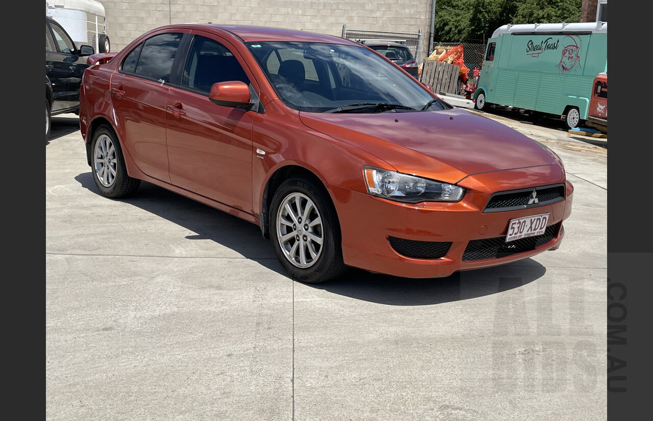 4/2011 Mitsubishi Lancer SX CJ MY11 4d Sedan Orange 2.0L