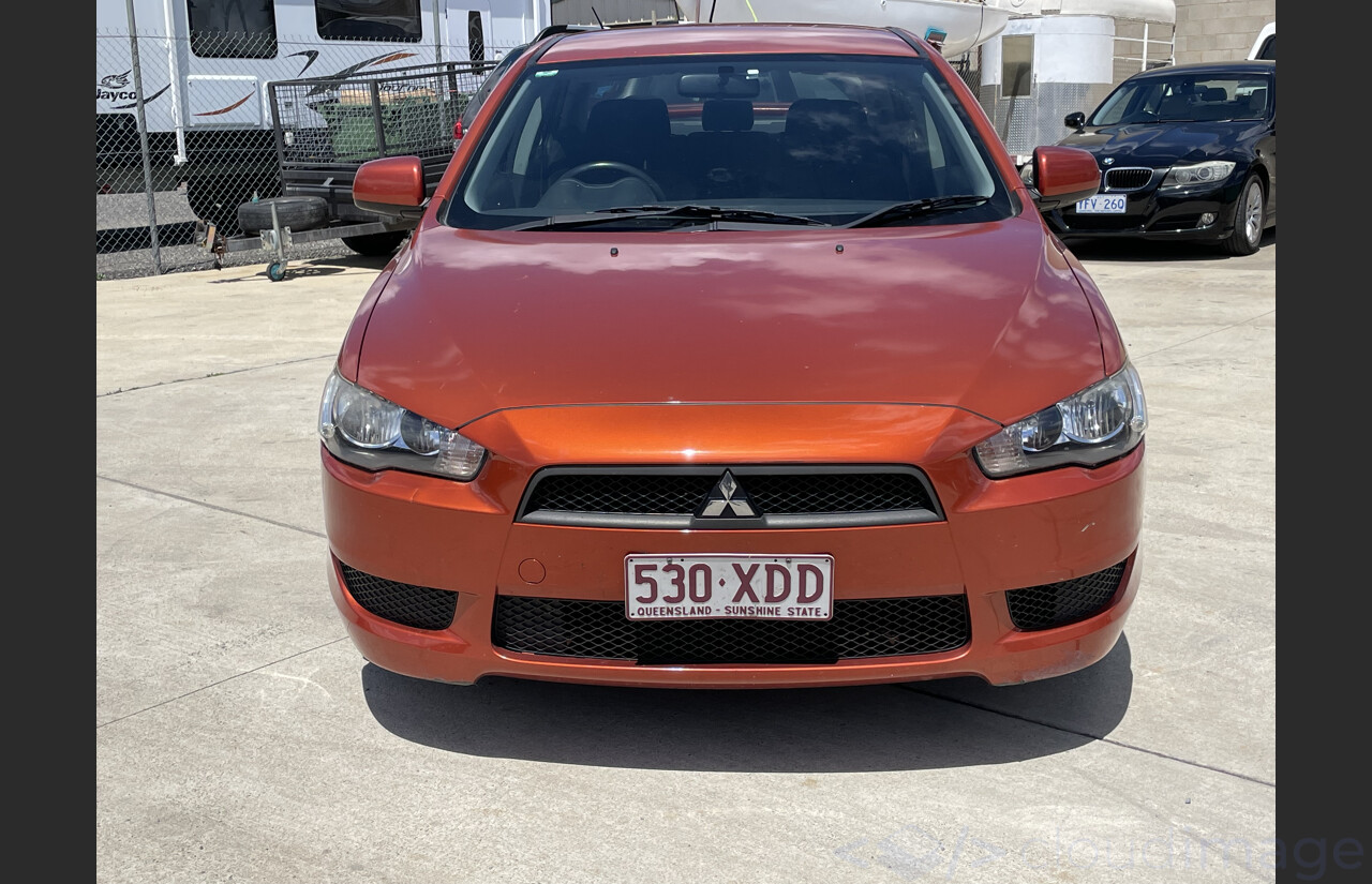 4/2011 Mitsubishi Lancer SX CJ MY11 4d Sedan Orange 2.0L