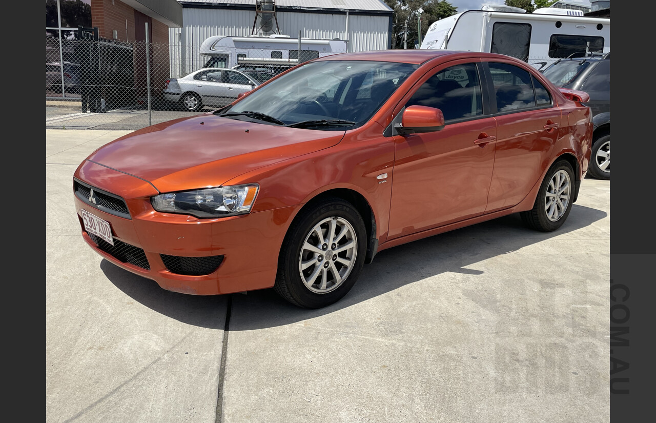 4/2011 Mitsubishi Lancer SX CJ MY11 4d Sedan Orange 2.0L