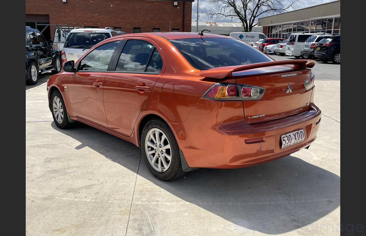 4/2011 Mitsubishi Lancer SX CJ MY11 4d Sedan Orange 2.0L