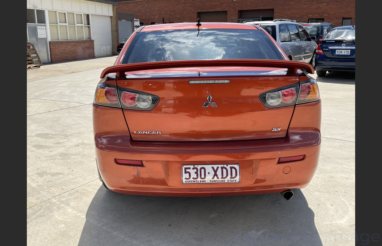 4/2011 Mitsubishi Lancer SX CJ MY11 4d Sedan Orange 2.0L