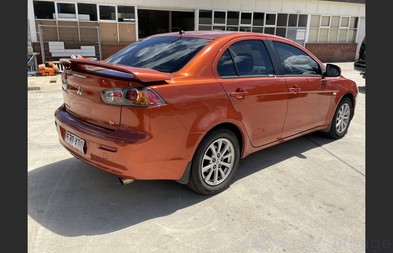 4/2011 Mitsubishi Lancer SX CJ MY11 4d Sedan Orange 2.0L