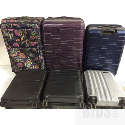 Assorted Damaged Luggage Cases, Brands Including: Antler, Tosca, and American Tourister.