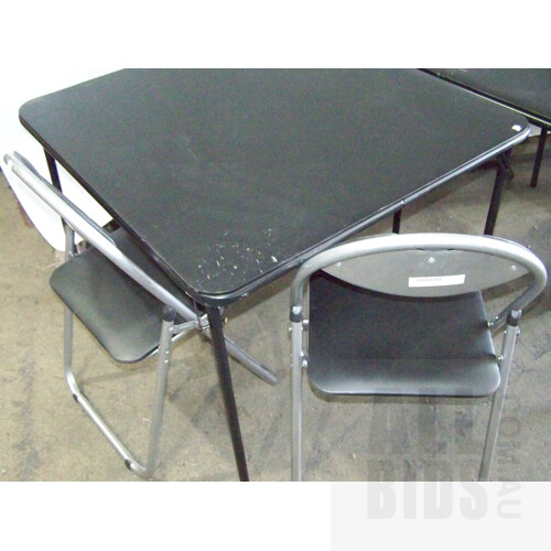 Two Folding Card Tables and Four Folding Chairs