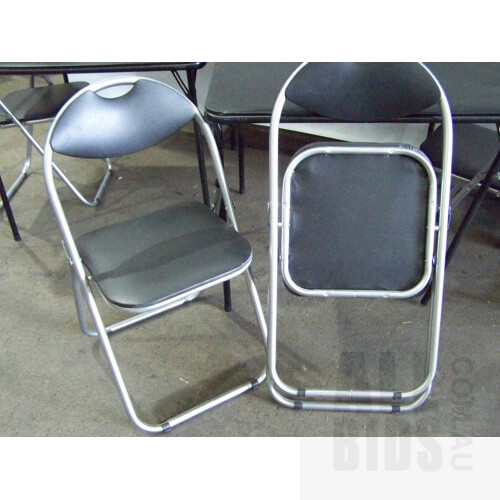 Two Folding Card Tables and Four Folding Chairs