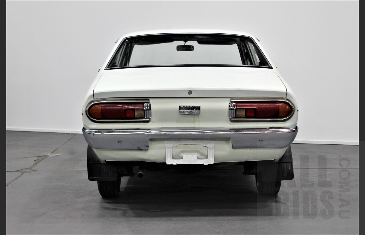 7/1974 Datsun 120y 4d Sedan White 1.2L