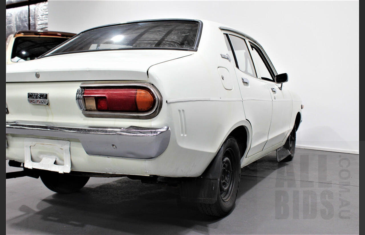 7/1974 Datsun 120y 4d Sedan White 1.2L