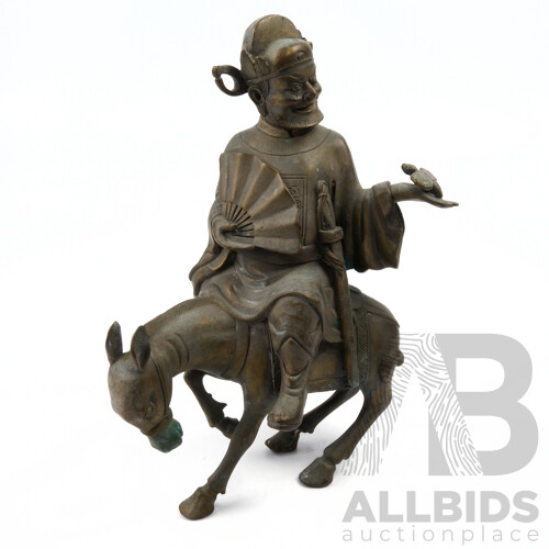 Brass Figure of a Chinese Scholar on a Donkey