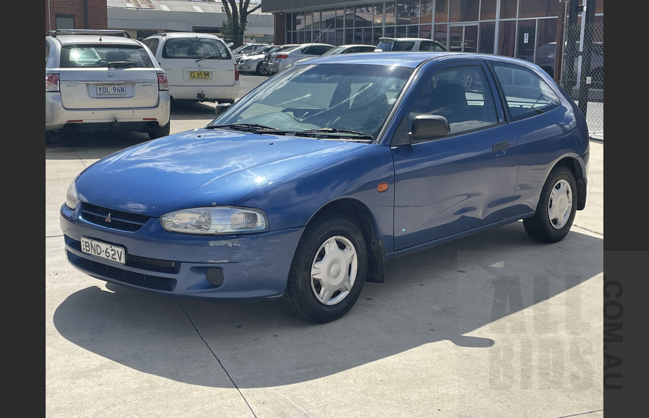 6/2000 Mitsubishi Mirage  CE 3d Hatchback Blue 1.5L