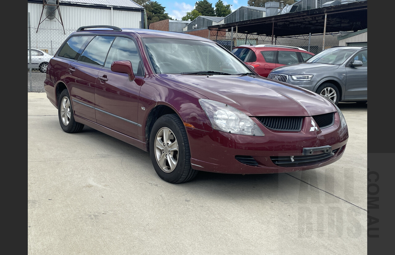 10/2004 Mitsubishi Magna LS TW SERIES II 4d Wagon Red 3.5L