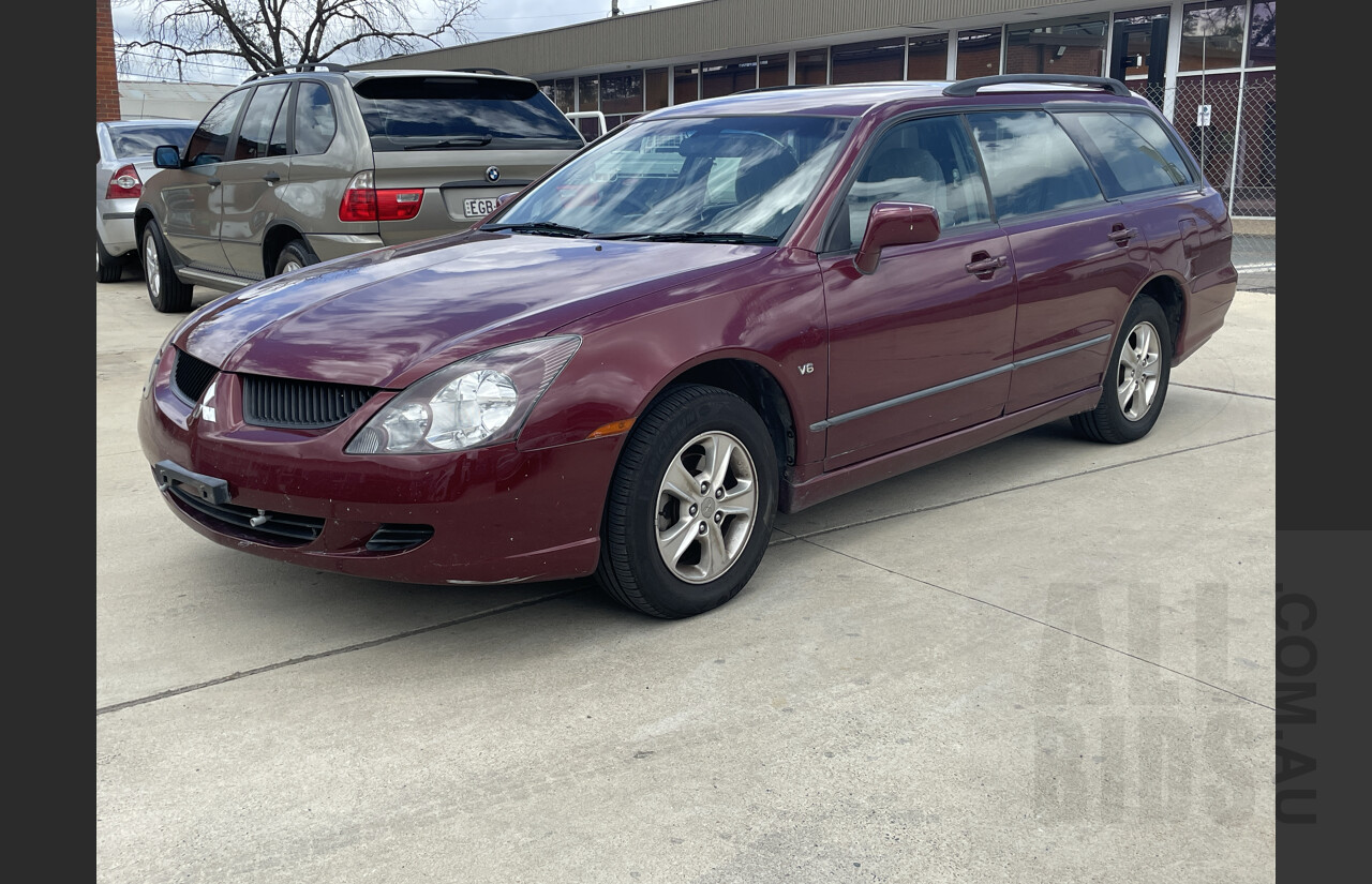 10/2004 Mitsubishi Magna LS TW SERIES II 4d Wagon Red 3.5L