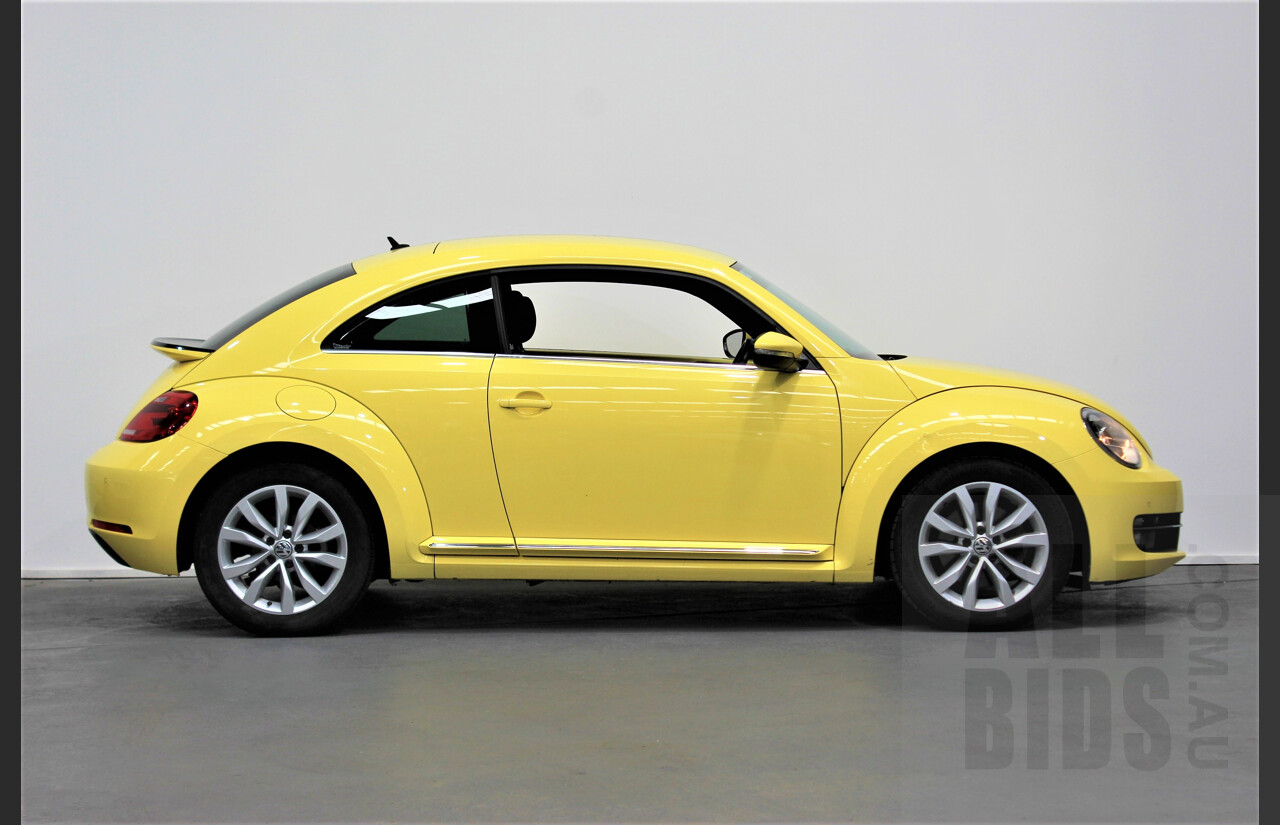 7/2013 Volkswagen Beetle 1L 3dr Hatchback Yellow 1.4L Twincharge Manual