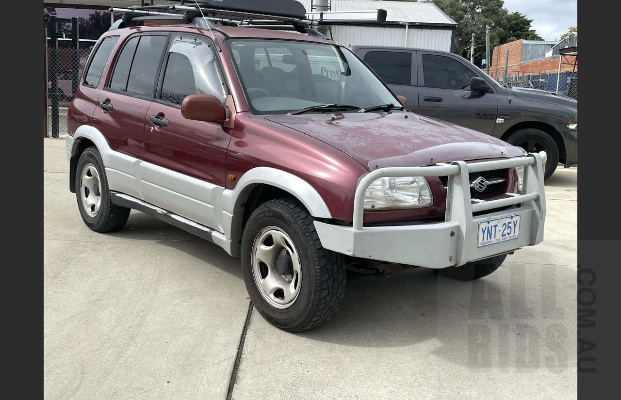 7/1999 Suzuki Grand Vitara (4x4)  4d Wagon Maroon and Silver 2.5L