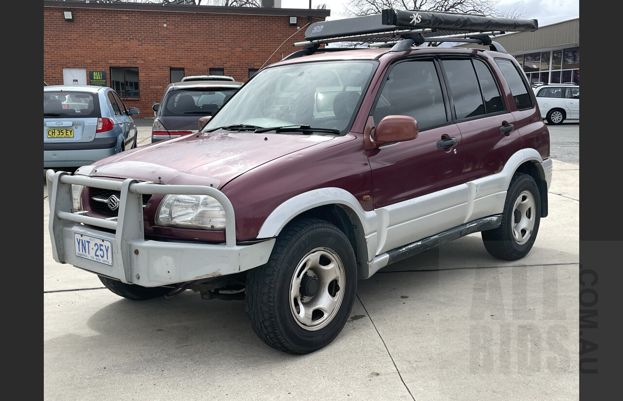 7/1999 Suzuki Grand Vitara (4x4)  4d Wagon Maroon and Silver 2.5L