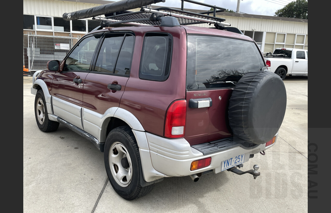 7/1999 Suzuki Grand Vitara (4x4)  4d Wagon Maroon and Silver 2.5L