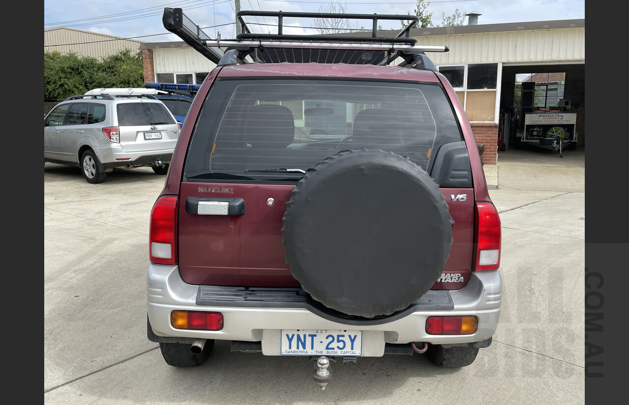 7/1999 Suzuki Grand Vitara (4x4)  4d Wagon Maroon and Silver 2.5L
