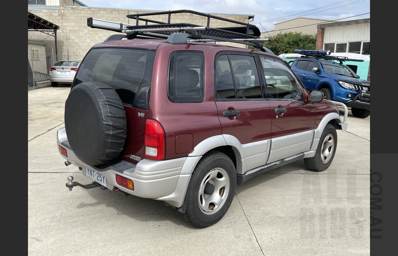 7/1999 Suzuki Grand Vitara (4x4)  4d Wagon Maroon and Silver 2.5L