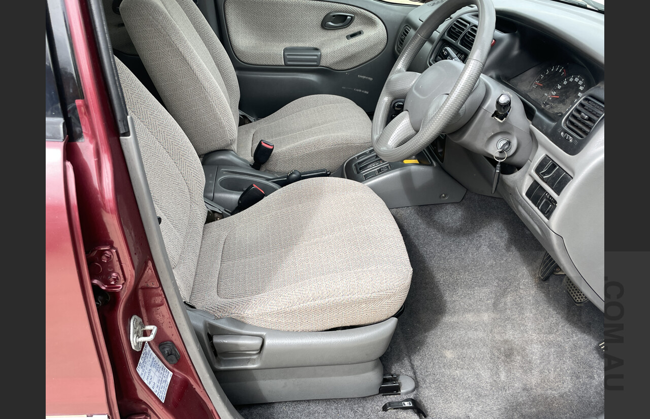 7/1999 Suzuki Grand Vitara (4x4)  4d Wagon Maroon and Silver 2.5L
