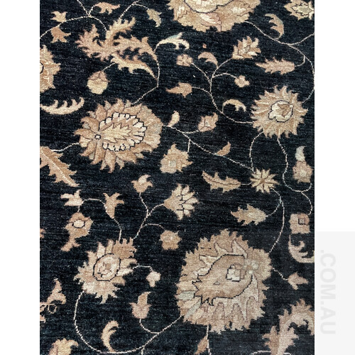 Large Woollen Carpet. Overall floral arabesque design, in tones of cream & cobalt. Some insect damage and light water staining, (305x245cm)