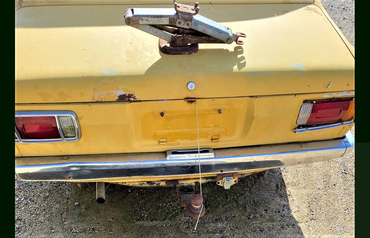 8/1973 Datsun 1200 Deluxe Sedan Yellow 1.2L
