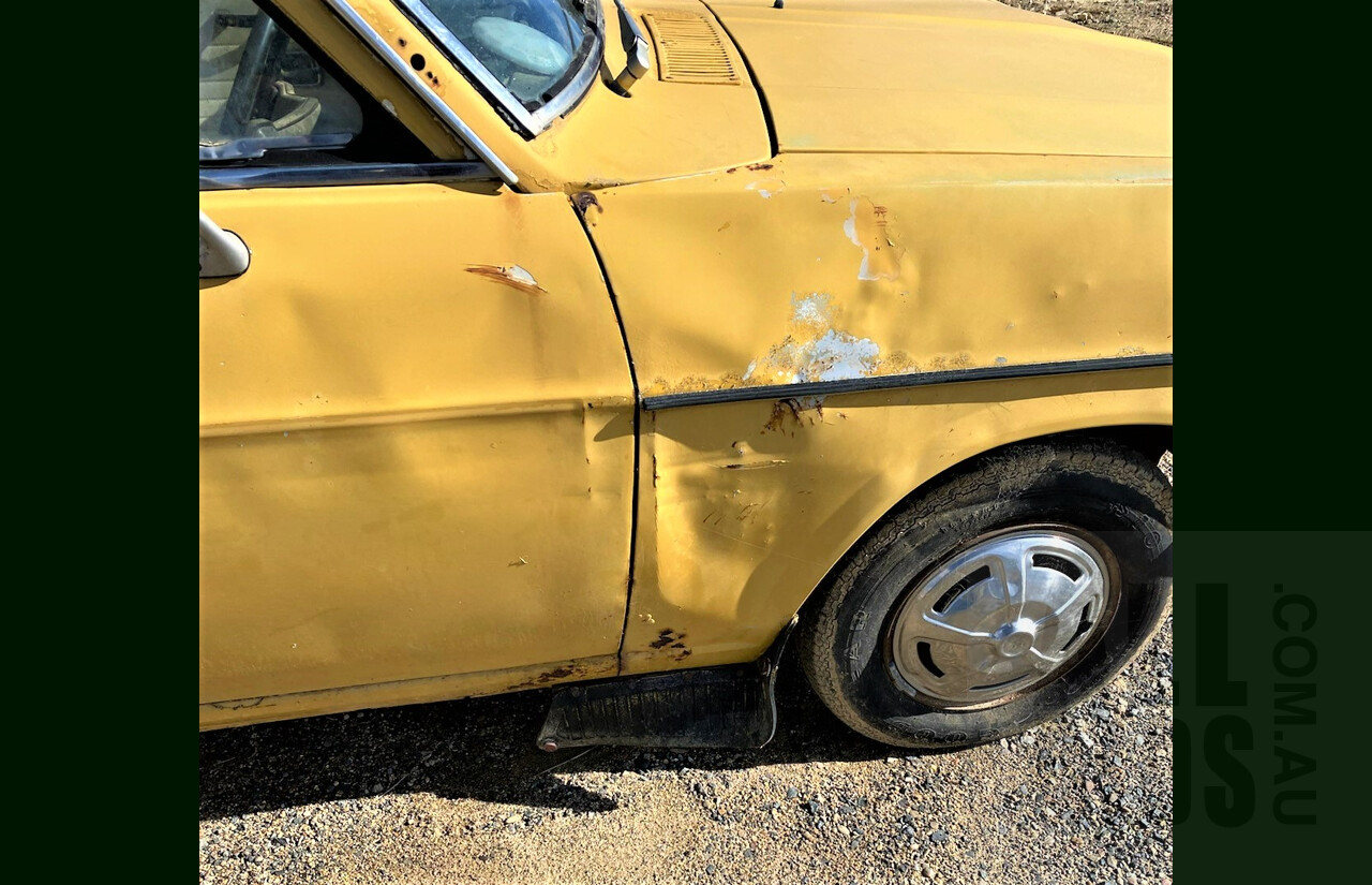 8/1973 Datsun 1200 Deluxe Sedan Yellow 1.2L