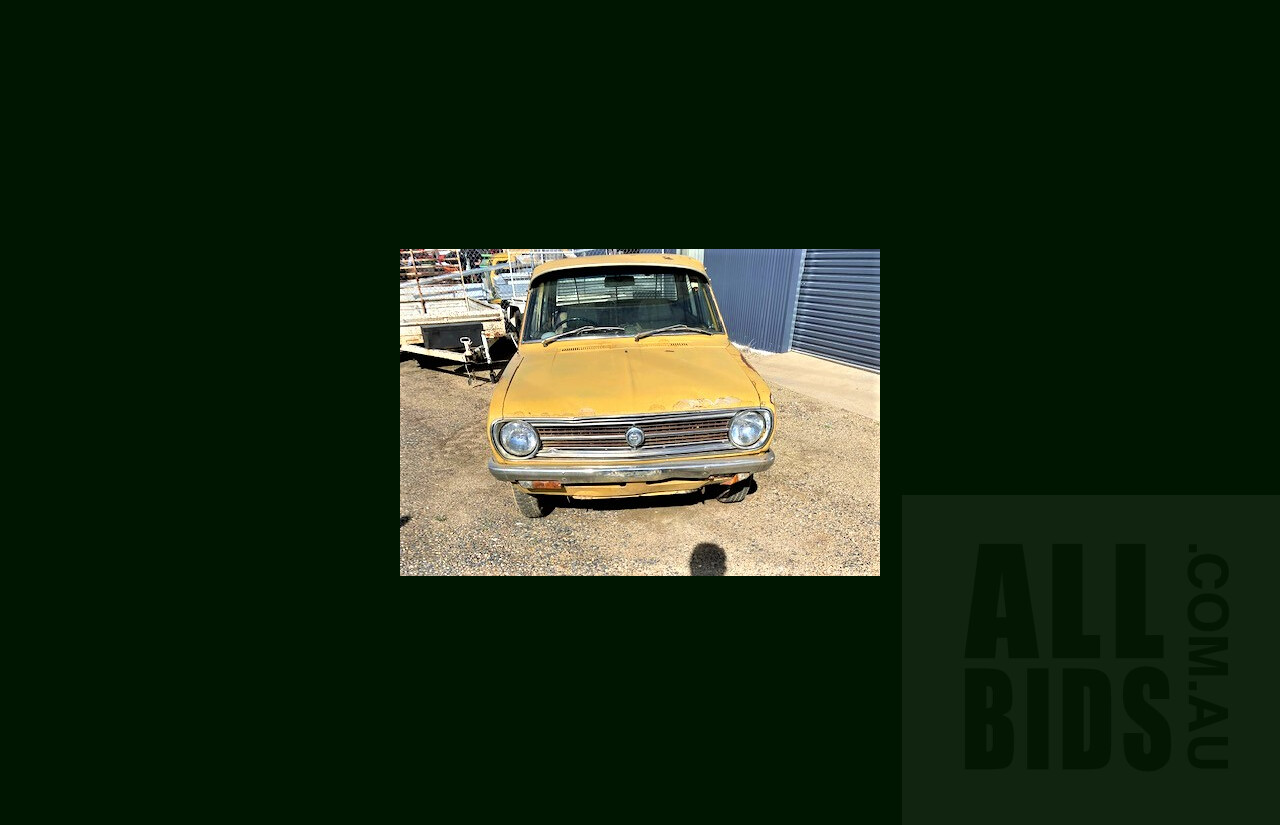8/1973 Datsun 1200 Deluxe Sedan Yellow 1.2L