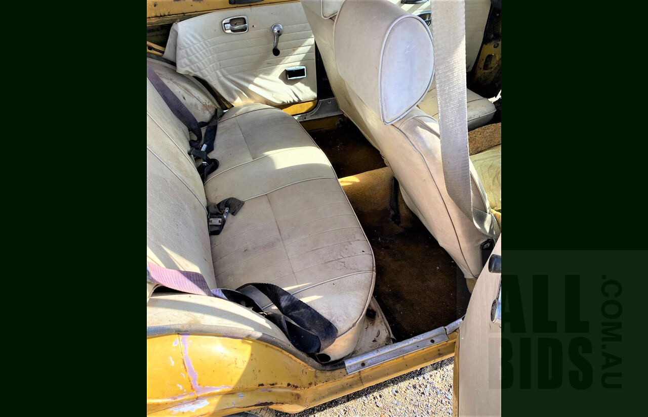 8/1973 Datsun 1200 Deluxe Sedan Yellow 1.2L