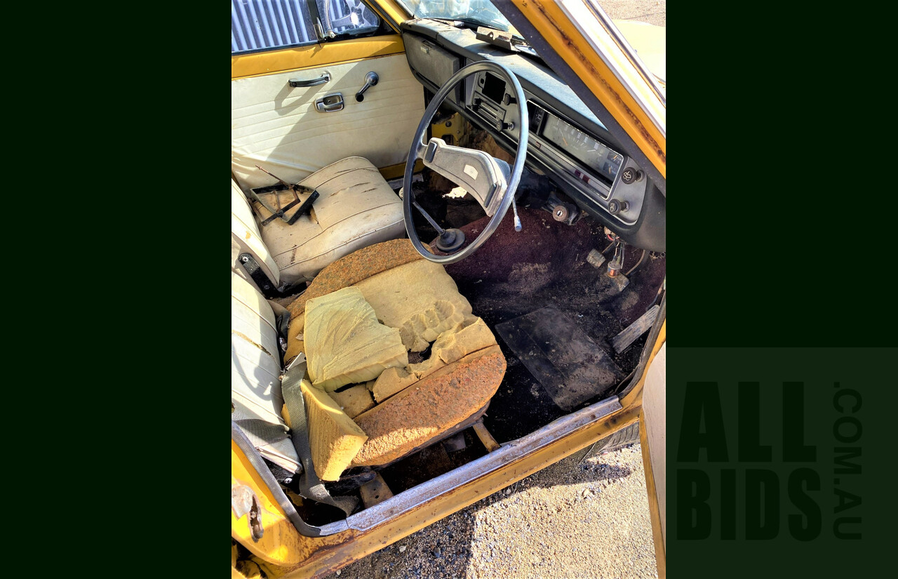 8/1973 Datsun 1200 Deluxe Sedan Yellow 1.2L