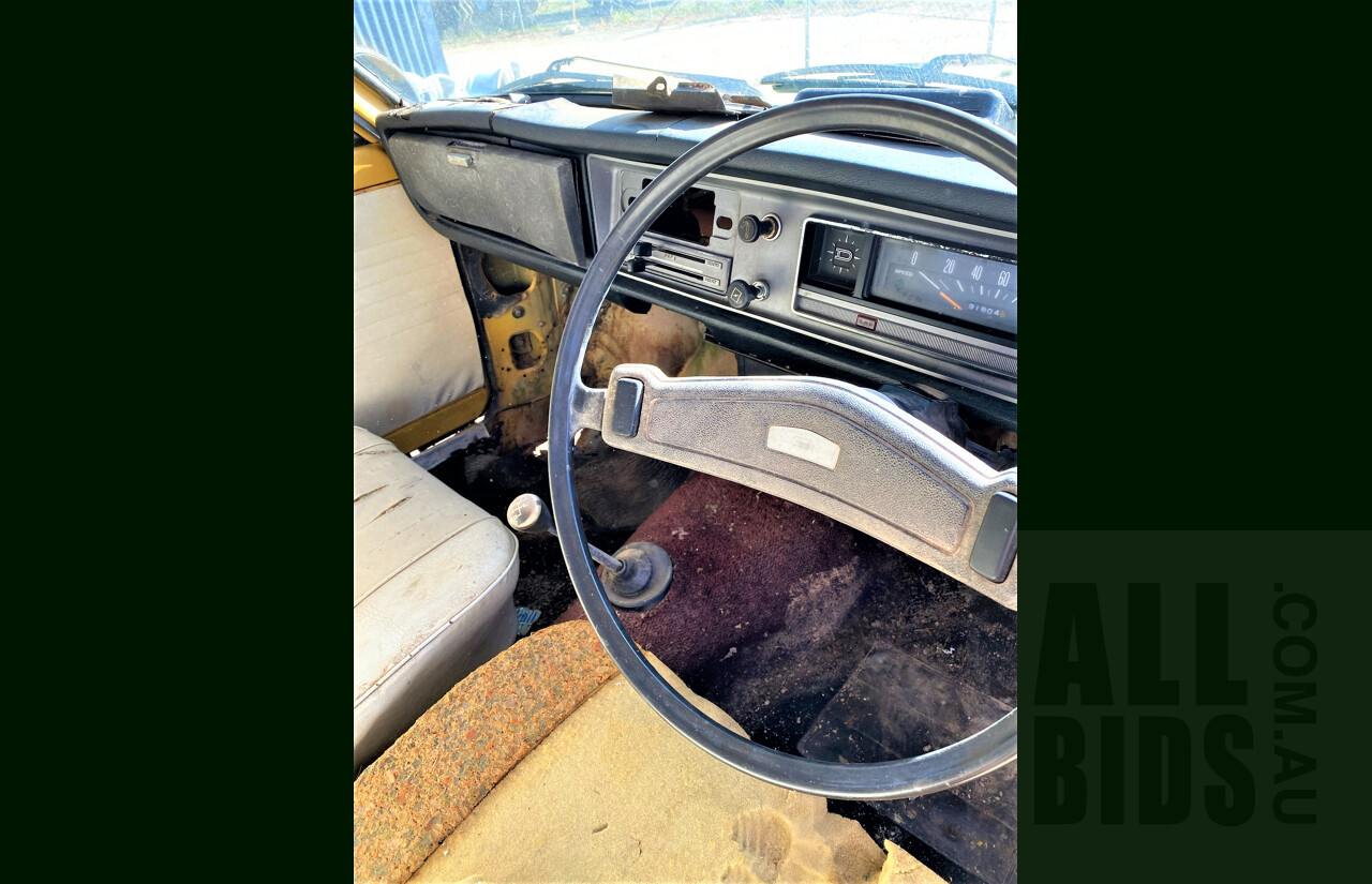 8/1973 Datsun 1200 Deluxe Sedan Yellow 1.2L