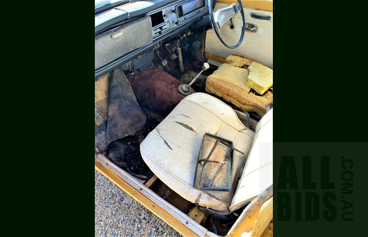 8/1973 Datsun 1200 Deluxe Sedan Yellow 1.2L