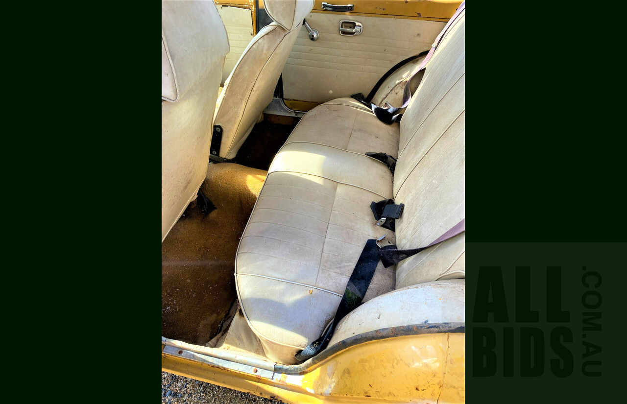 8/1973 Datsun 1200 Deluxe Sedan Yellow 1.2L