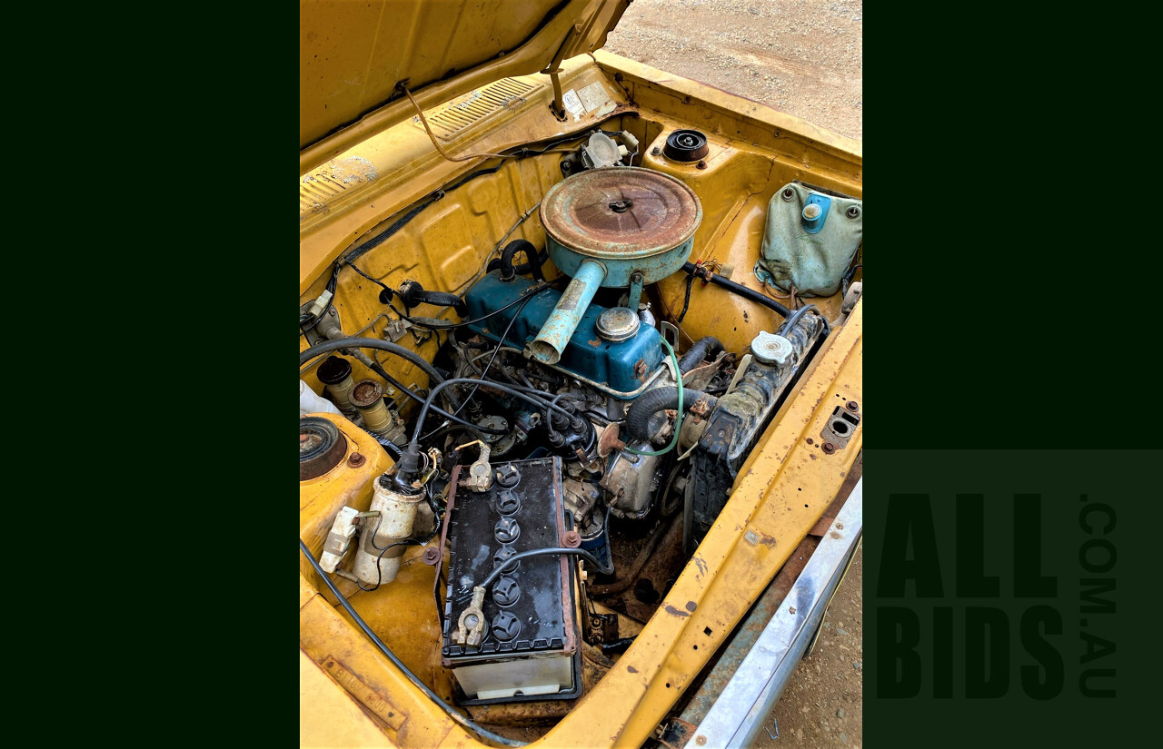 8/1973 Datsun 1200 Deluxe Sedan Yellow 1.2L