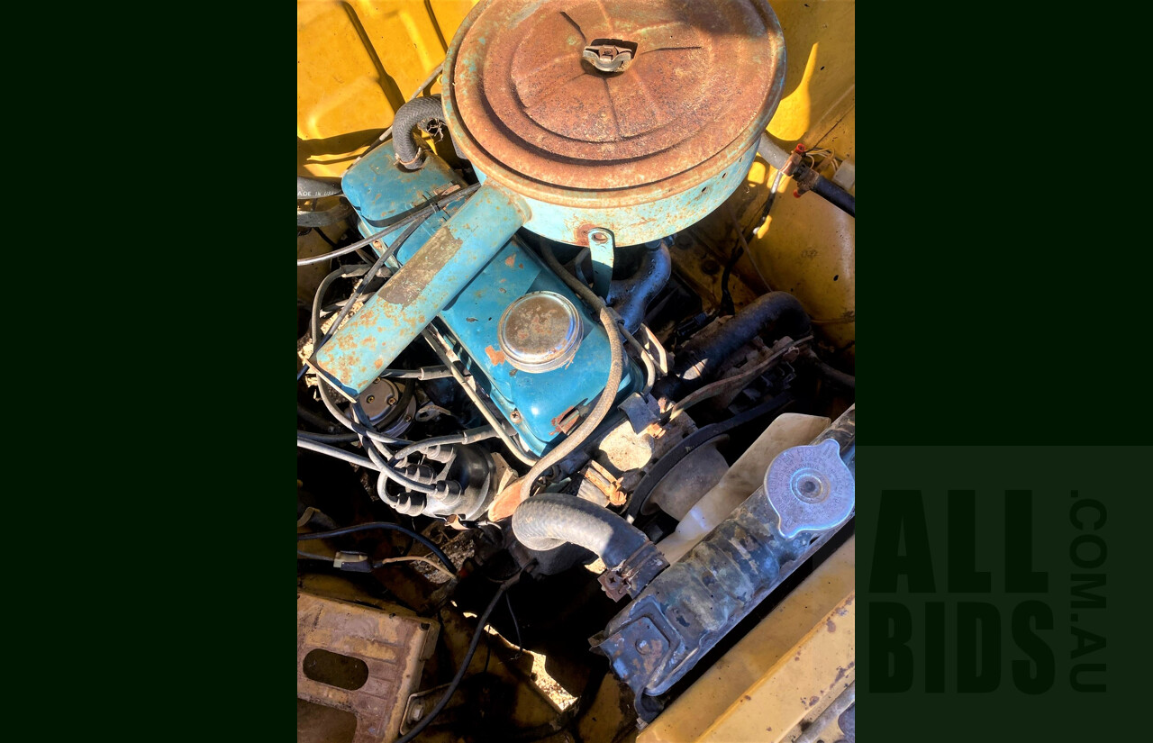 8/1973 Datsun 1200 Deluxe Sedan Yellow 1.2L