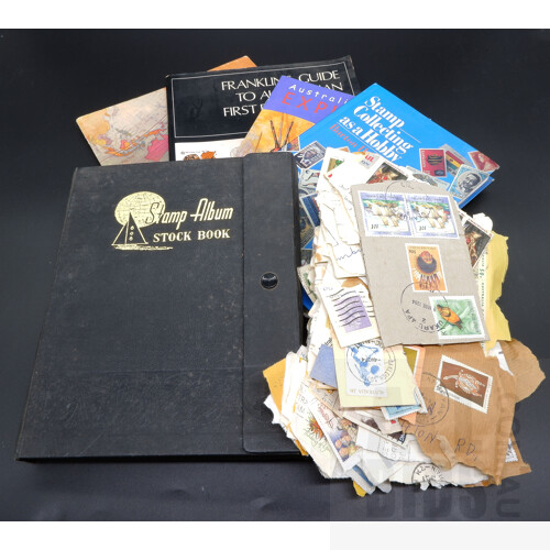 Four Stamp Collector Books, One Stamp album and a Small Collection of Australian and International Stamps