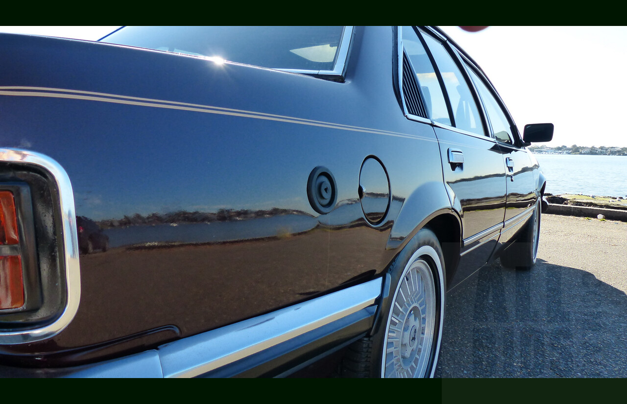 5/1981 Holden Commodore SL/E VC 4d Sedan Dark Carmine Metallic 4.2L V8