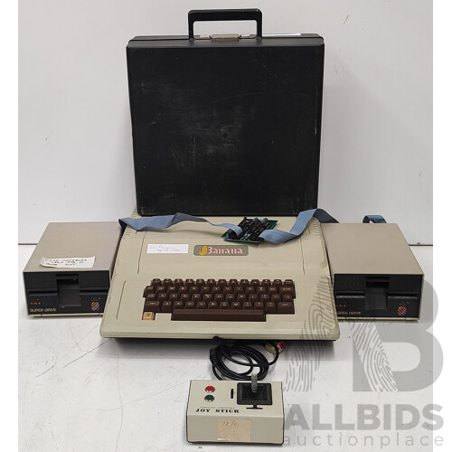 Banana Apple II Clone, w/ Two ‘Pineapple’ 5.25-Inch Disk Drives and Joystick in Plastic Case.