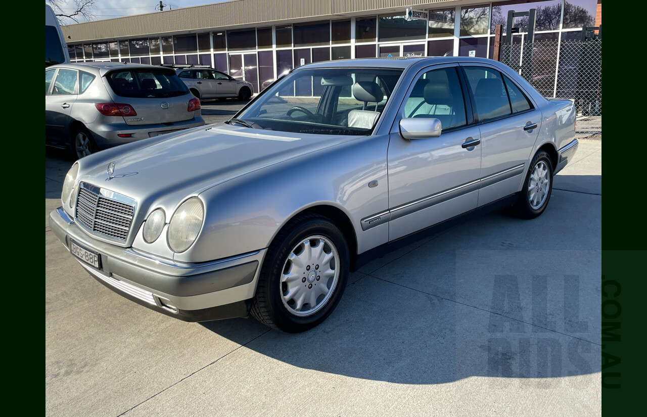 6/1998 Mercedes-Benz E320 Elegance W210 4d Sedan Silver 3.2L