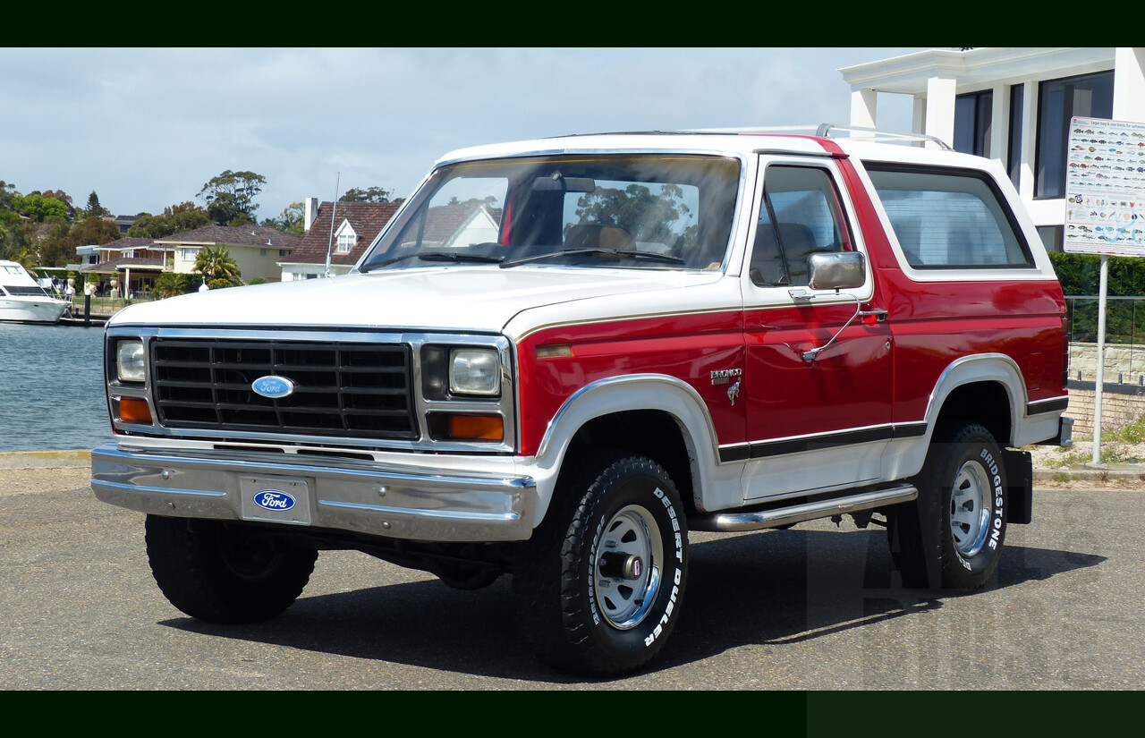 10/1984 Ford Bronco XLT (4x4) 2d Wagon Monza Red/White 351ci 5.8L V8